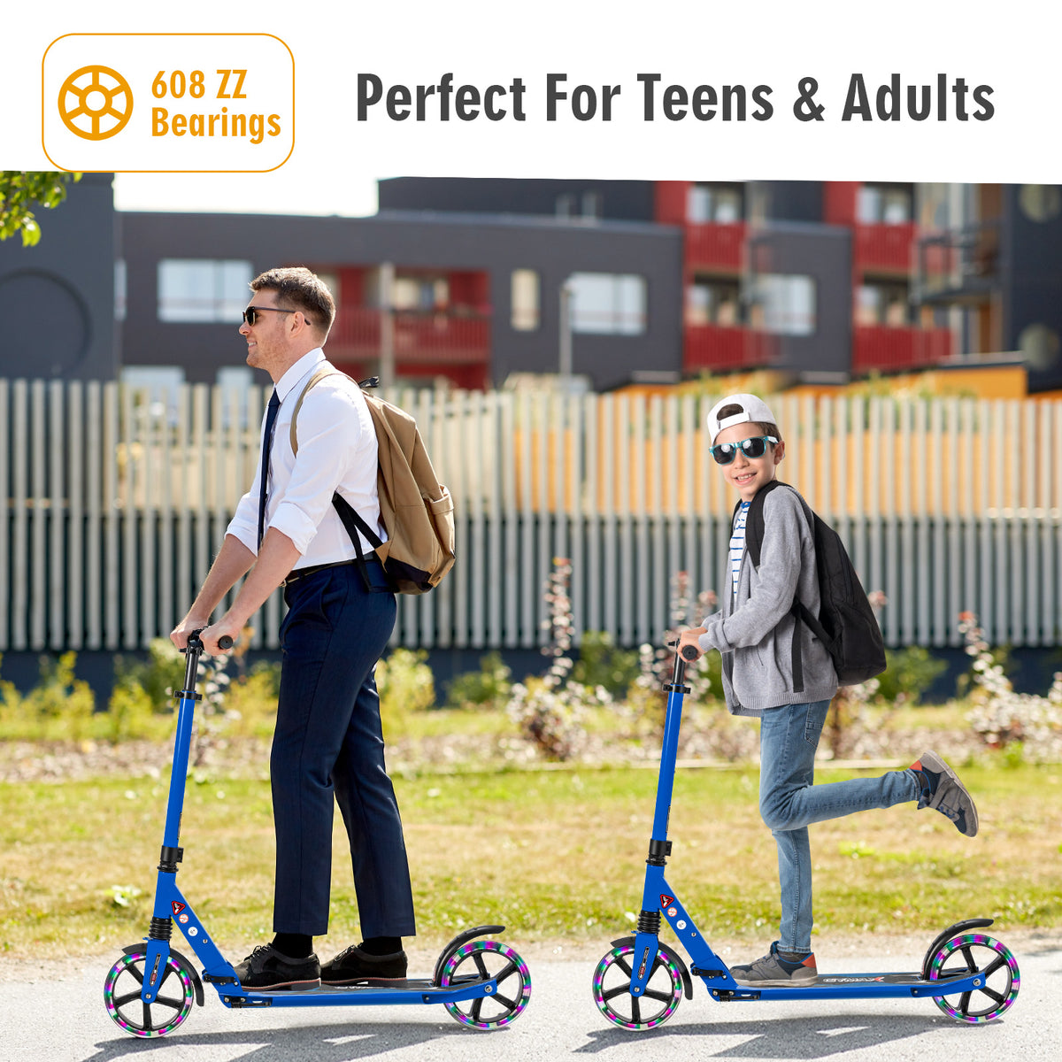 A man and a boy ride blue kick scooters outdoors