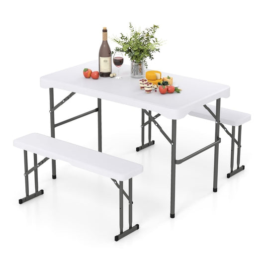 Folding Picnic Table Bench Set with wood grain HDPE tabletop and white benches, set up for a meal