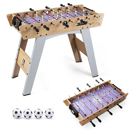 The foosball table and four balls shown from a different angle