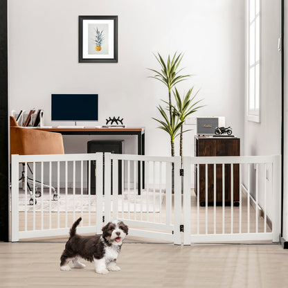 The pet gate is set up in a home office with a dog
