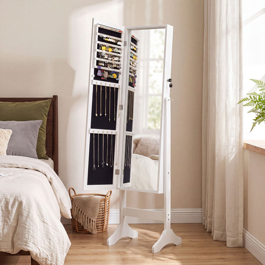 The white cabinet standing in a bedroom next to a bed and a woven basket