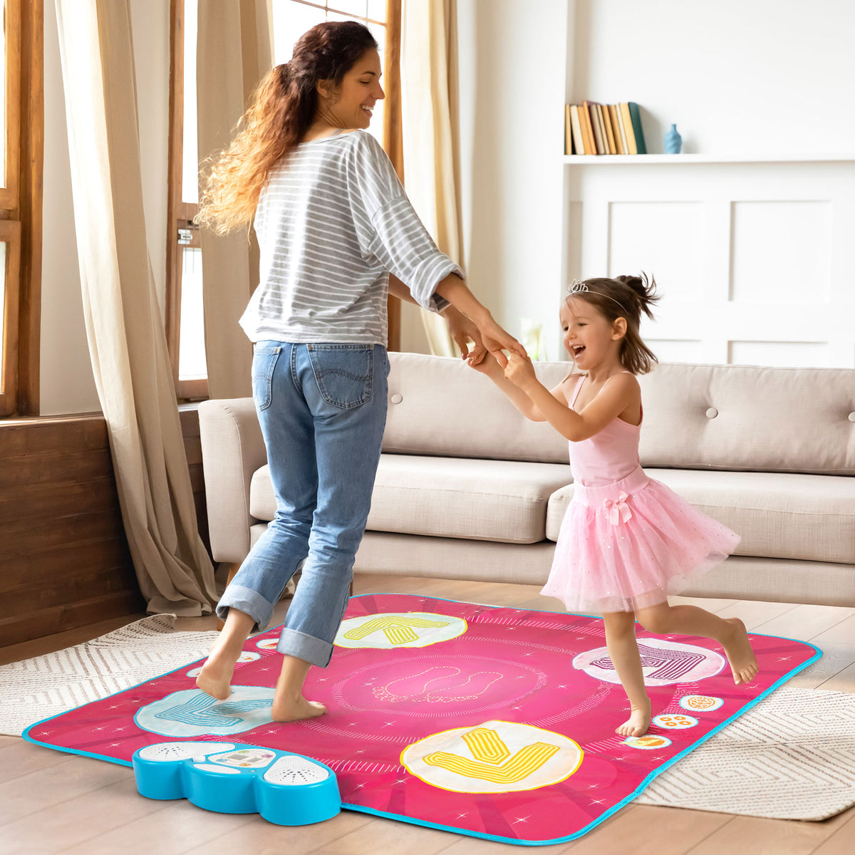 Fun Dance Mat, a mother and daughter enjoy dancing together on the musical instrument in a living room