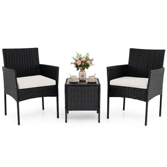 Garden Furniture Set a three-piece rattan balcony furniture set with two cushioned chairs and a coffee table