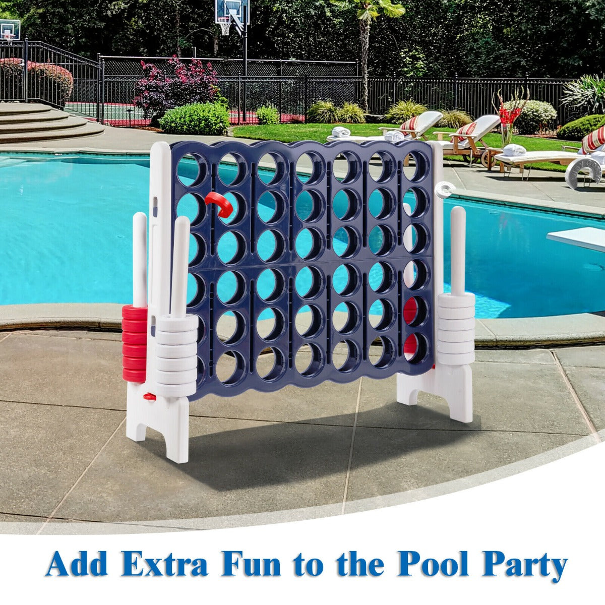 The lawn game placed on a patio next to a swimming pool on a bright sunny day