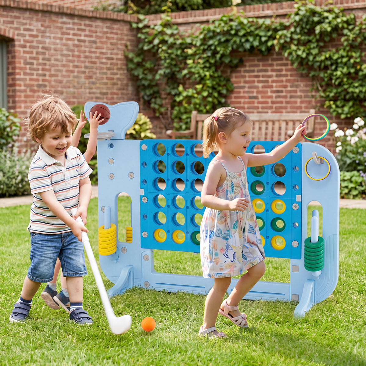 Children playing with the lawn games connect four set in a garden