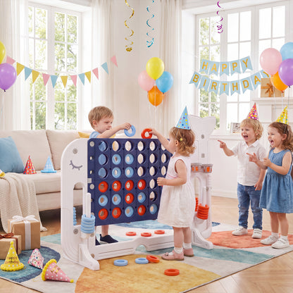 Kids playing the indoor games set in a decorated room with balloons