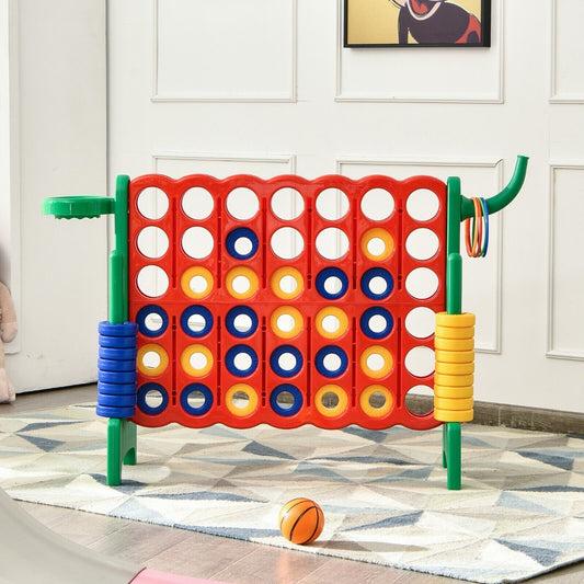 The lawn game set up indoors on a rug with a basketball nearby