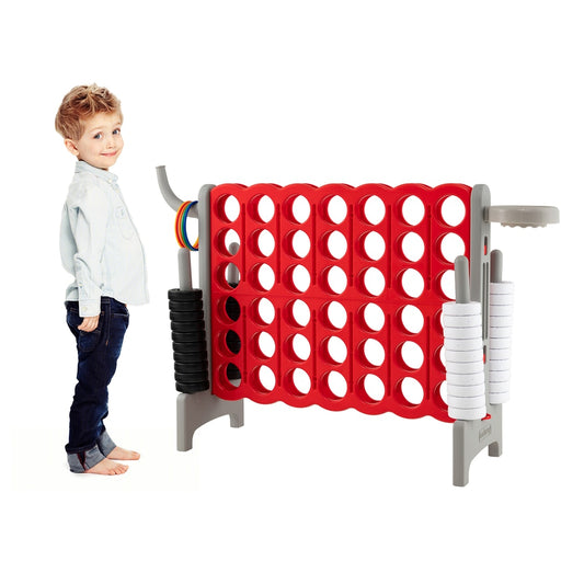 Giant Connect 4 Game Jumbo with 42 Rings standing next to a young boy