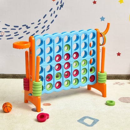 The lawn game stands on a patterned rug with a basketball and loose rings scattered nearby