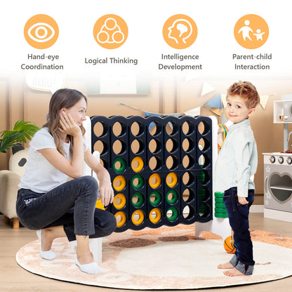 A woman and child playing the lawn game indoors