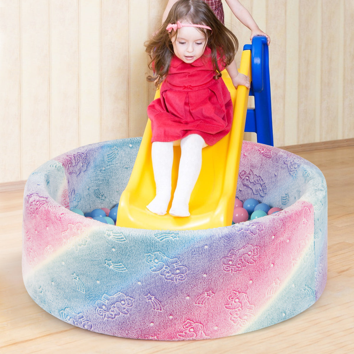 Glow in the Dark Round Ball Pool, a little girl slides into the baby playpen & playards from a yellow slide