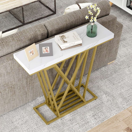 The modern sofa table is placed next to a grey sofa in a living room setting