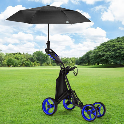 The golf trolley standing on a grassy field with a black umbrella attached