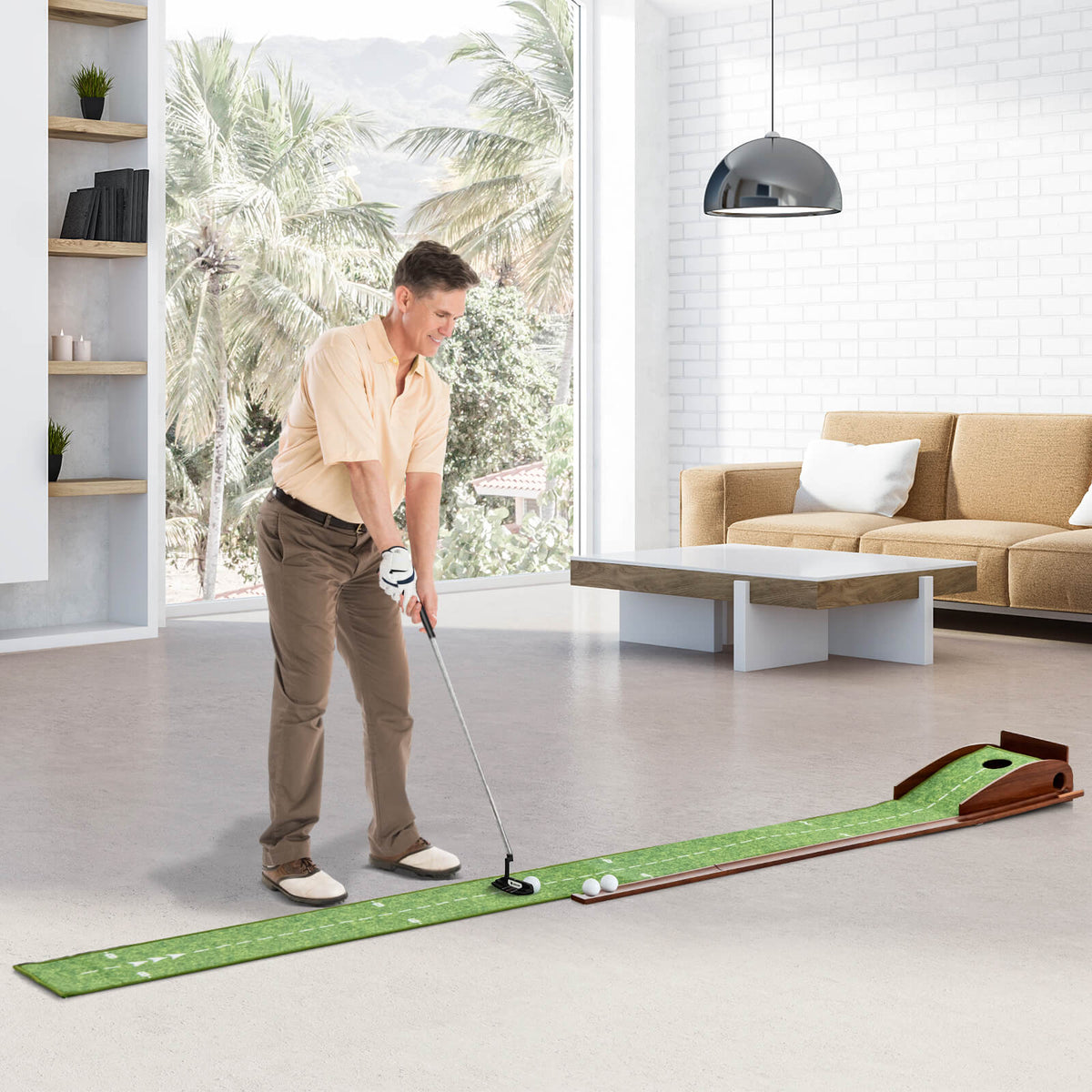 The golf putting mat training aid in use indoors with a man practising his putting