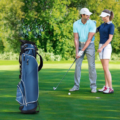 The navy golf stand bag on a golf course with a man and woman playing golf