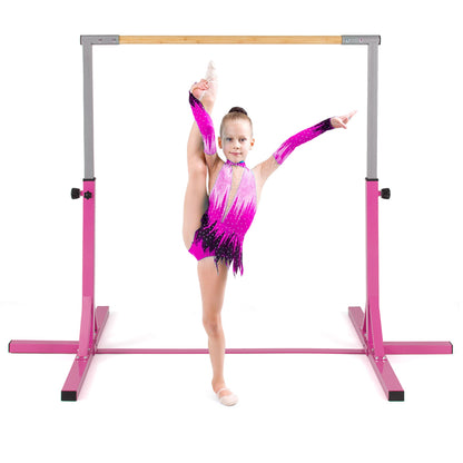 The pink gymnastics bar with a girl in a split pose