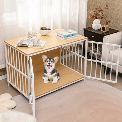 A happy puppy sits in the open dog kennel furniture, with a lamp and books on top