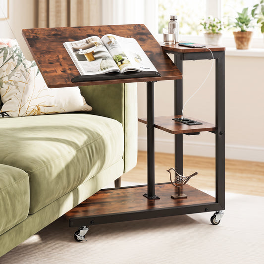 The end & side table next to a sofa with a book and water bottle on it