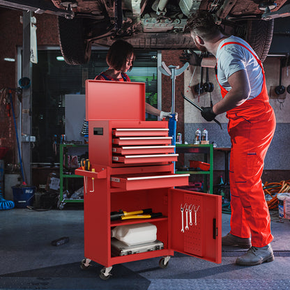 Red tool storage cabinet in use in a garage with people working on a car
