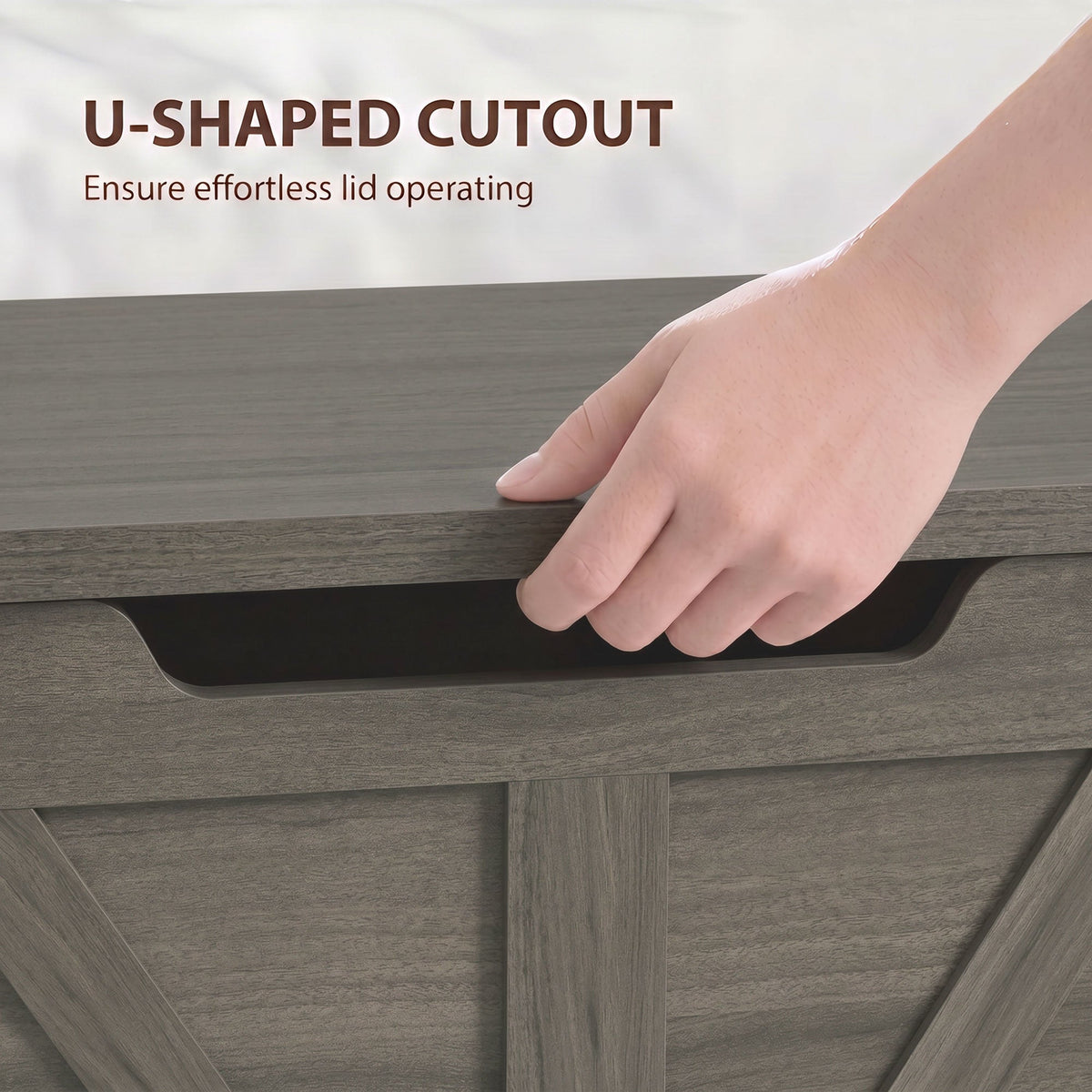 The storage cabinet featuring a close-up of the U-shaped cutout for easy lid opening