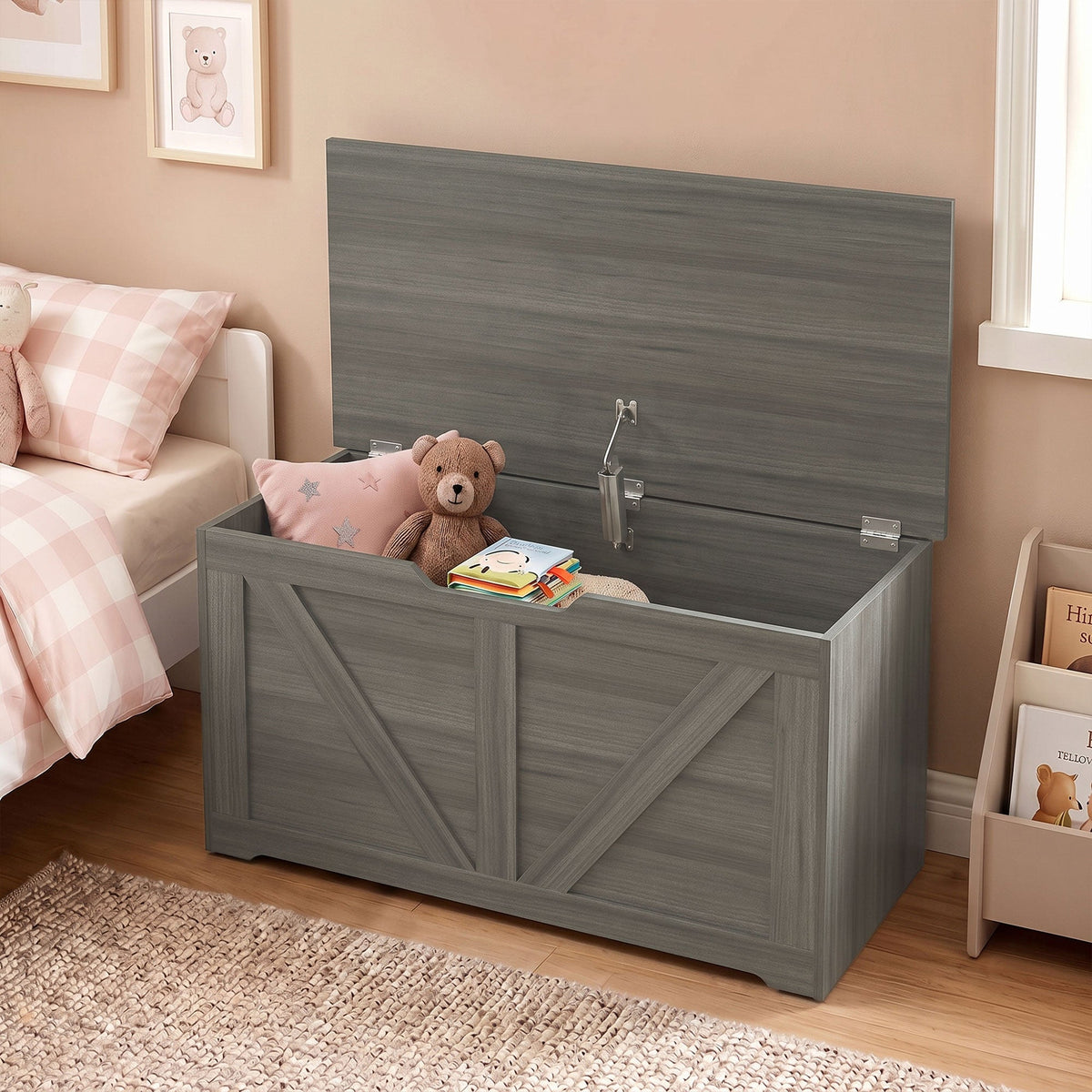 The storage cabinet positioned in a child's bedroom with a teddy bear and books inside