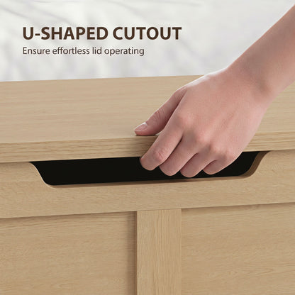 Hand opening the storage cabinet using the U-shaped cutout