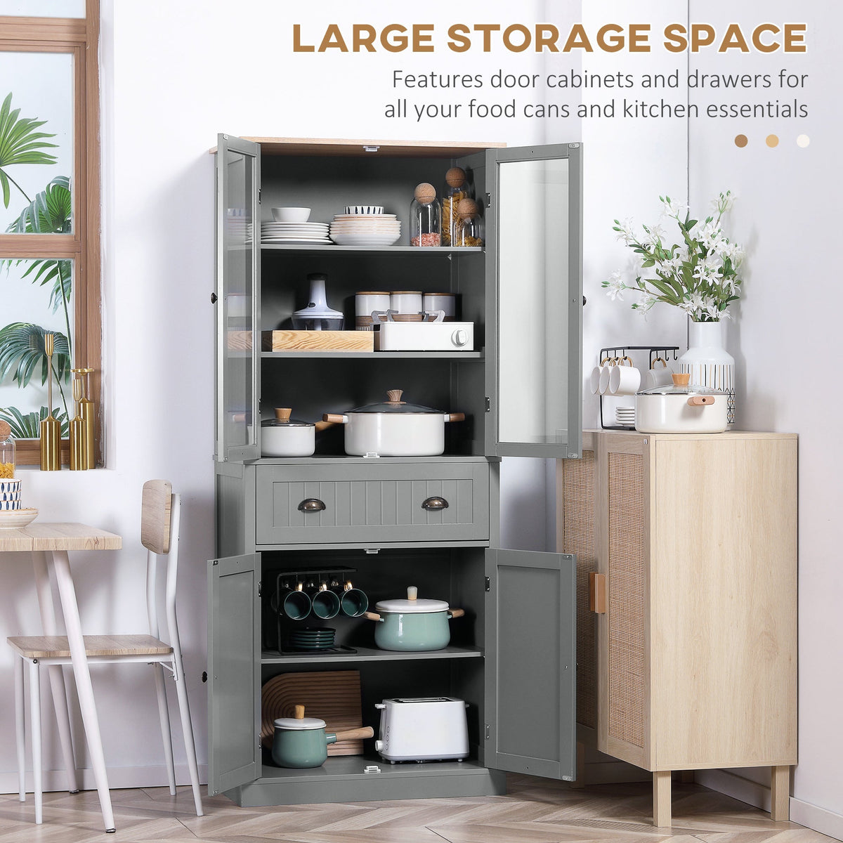 The kitchen furniture with all doors open showing shelves filled with kitchenware
