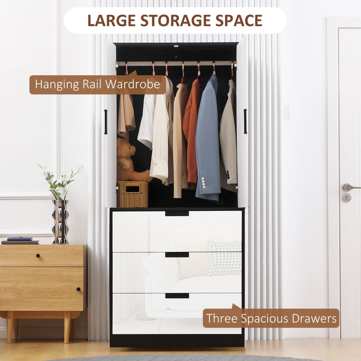 The large storage space wardrobe shows hanging rail and three drawers
