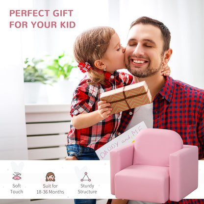 A father receiving a gift from his daughter, with the pink kids sofa chair nearby
