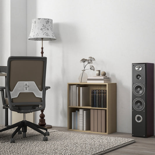 The low bookcase is shown in a home office setting with a chair and speaker