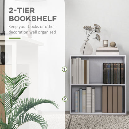 The white low bookcase filled with books and ornaments placed on a rug in a room