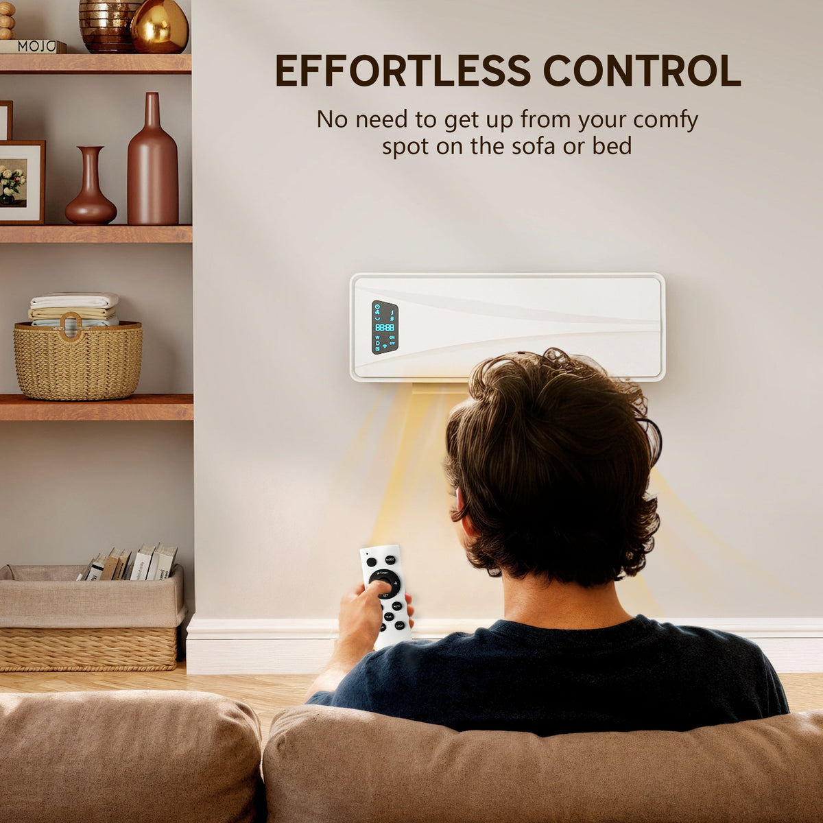 A person sitting on a sofa using the remote control to operate the wall mounted heater