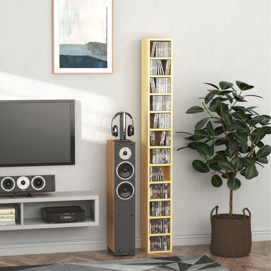 The tall narrow media storage tower in a living room setting next to a television and speaker