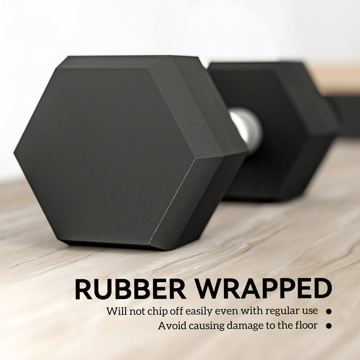 Close up of the rubber coating on the black weights to protect the gym floor surface