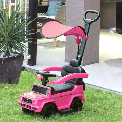 Pink ride-on push car for toddlers in a garden setting