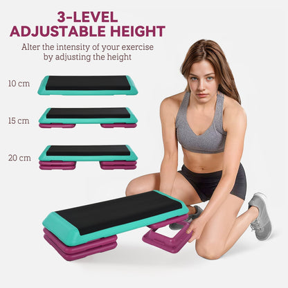 A woman adjusting the height of the aerobic step