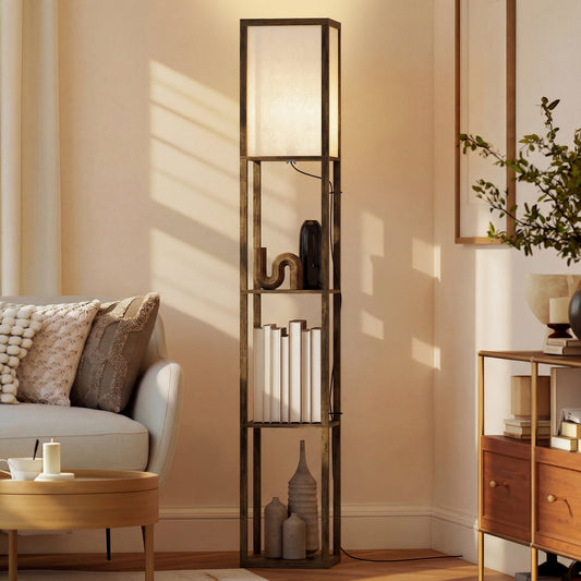 The floor lamp standing in a living room with decorative items placed on its storage shelves