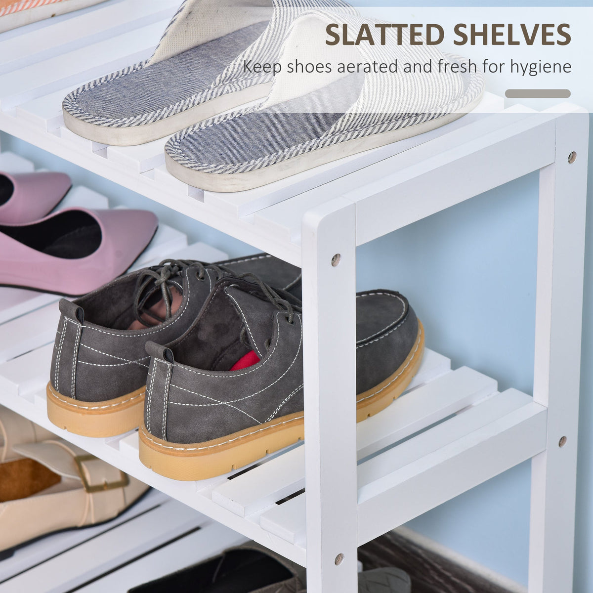 Close-up of the slatted shelves on the white shoe storage unit