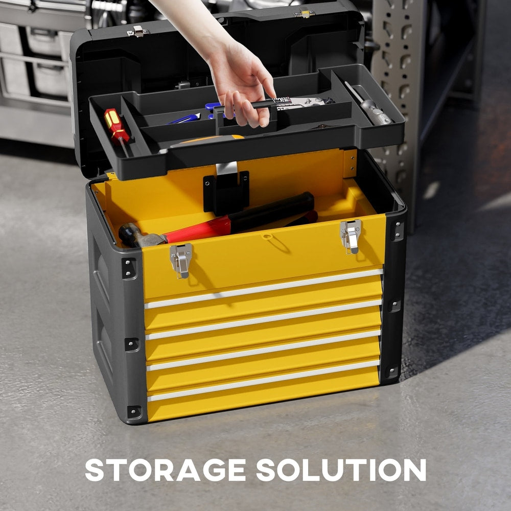 A hand reaches into the top compartment of the yellow and black four drawer toolbox
