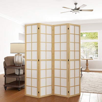 The freestanding room separator is set up in a living room, dividing the space between a sofa and a dining area
