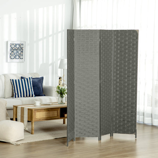 The grey four-panel room divider set up in a living room behind a sofa