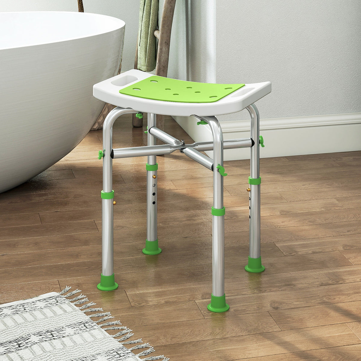 The green shower stool in a bathroom next to a bathtub on a rug