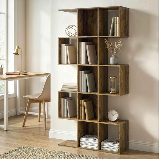 The S shaped geometric bookcase is shown in a modern room with books and decorative items on its shelves