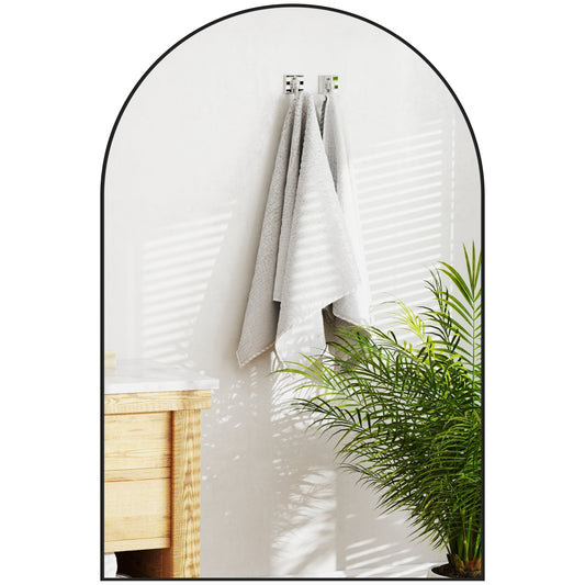 HOMCOM Arched Home Mirror with a black frame, shown hanging on a wall with a towel and a plant