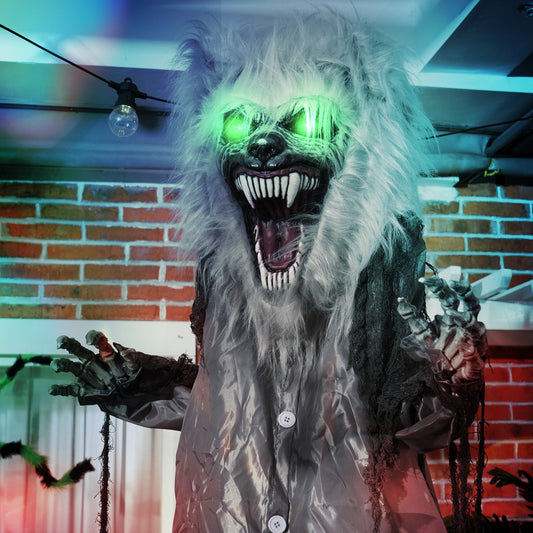 Close up of the terrifying werewolf animatronic's face with glowing eyes and sharp teeth