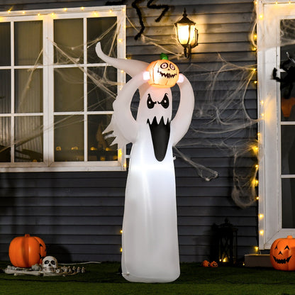 The Halloween inflatable decoration is shown outdoors at night, lit up with other decorations