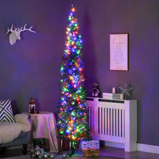 The artificial christmas tree decorated with colourful lights in a cosy living room setting