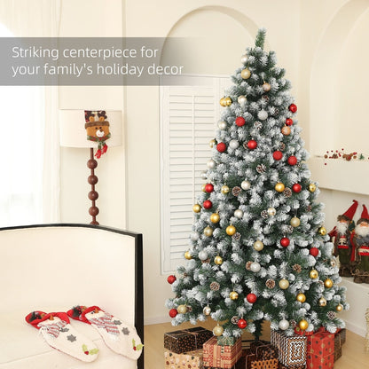 The artificial christmas tree decorated with red and gold baubles in a festive home