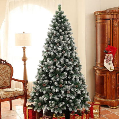 The artificial christmas tree decorated with pine cones in a cosy living room setting