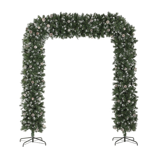 HOMCOM 8.2 ft Snow Frosted Christmas Tree Arch with pinecones and a metal stand